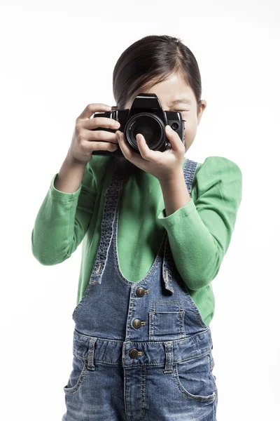 A girl(kid) hold a camera — Stock Photo, Image