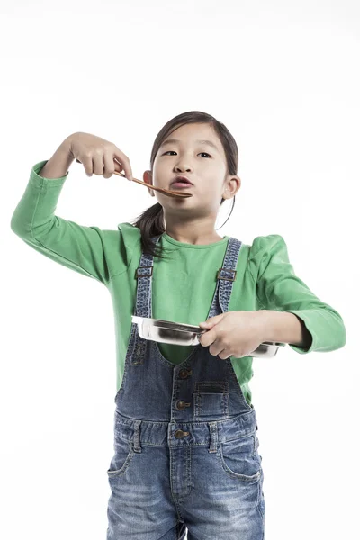 A child in a kitchen with food tray. — Stock Photo, Image