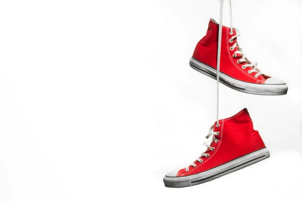 Red Hanging Sneakers — Stock Photo, Image