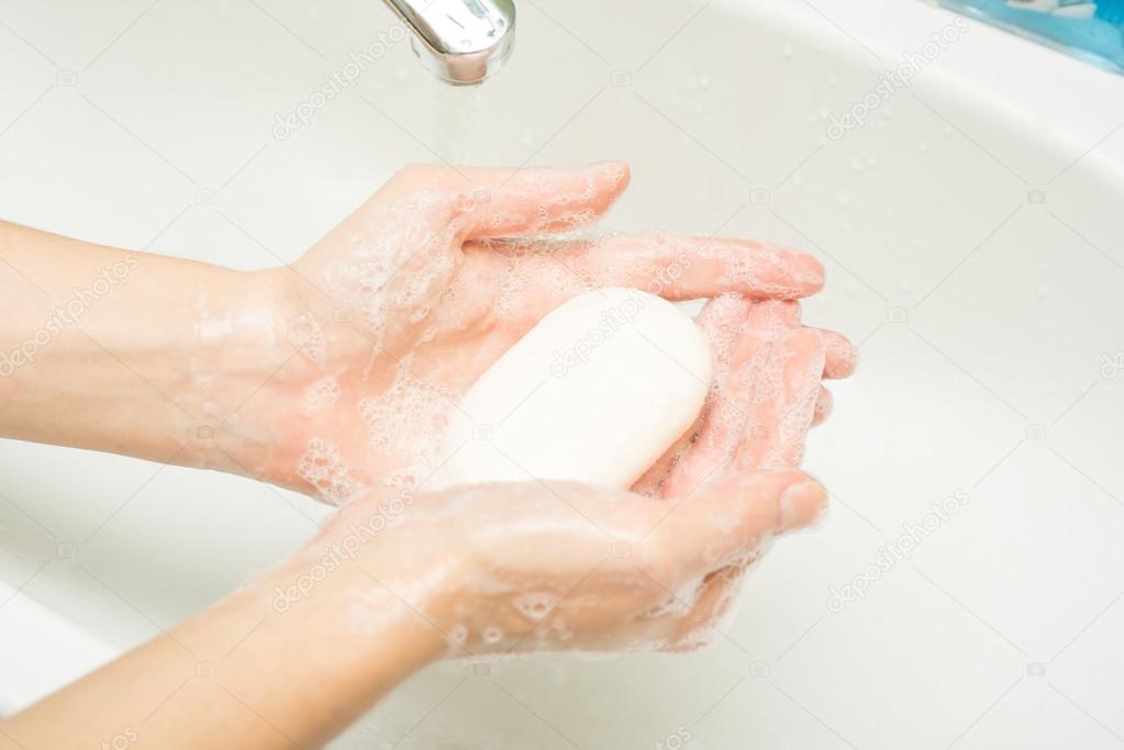 Hygiene. Cleaning Hands. Washing hands with soap and water.