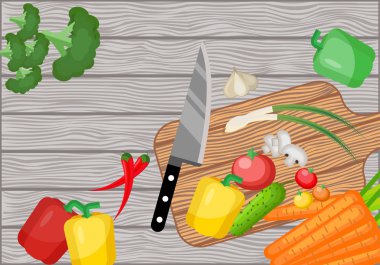 Eski bir ahşap masada yemek pişirmek için malzemeler.