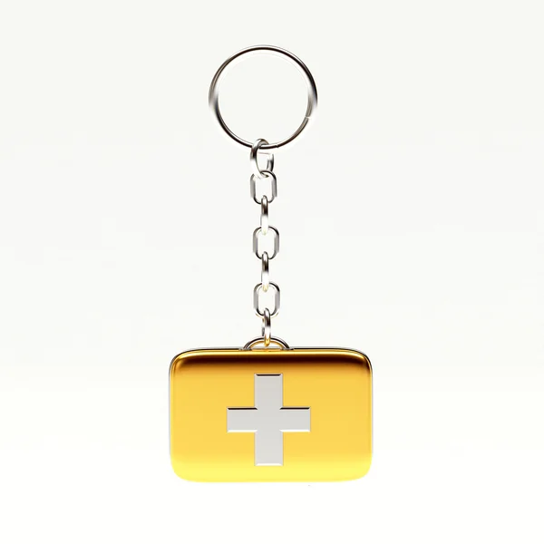 의료 가방 형태로 황금 열쇠 고리 — 스톡 사진
