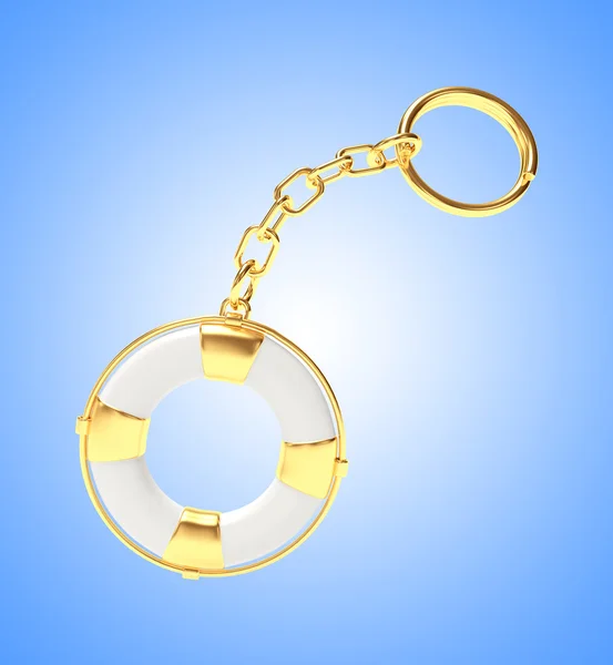 Keychain in the form of golden lifebuoy on blue background — Stock Photo, Image