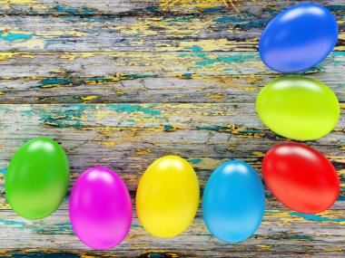 Bir ahşap üzerine renkli Paskalya yumurtaları