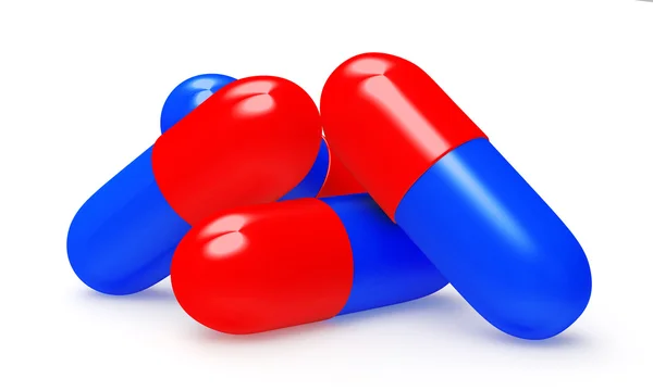 红色和蓝色的医疗胶囊 — 图库照片