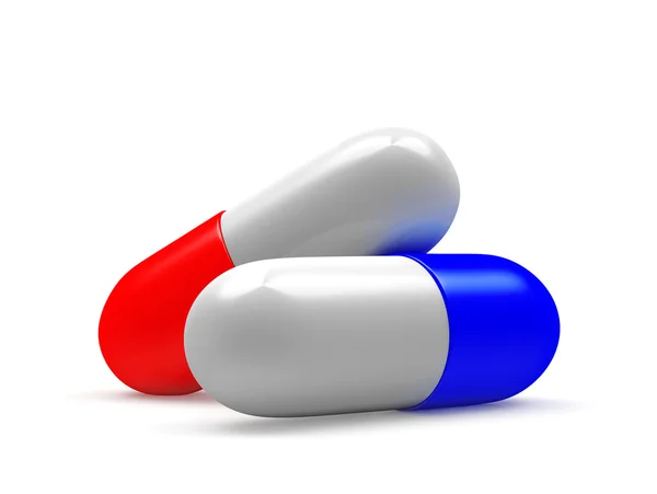 Red and blue medical capsules — Stock Photo, Image