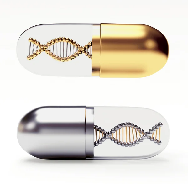 Golden and silver medical capsules with a DNA molecule structure inside — Stock Photo, Image