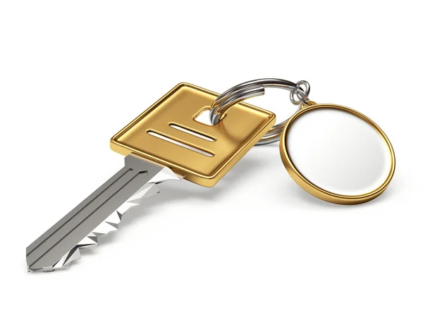Χρυσά κλειδιά σπίτι-σχήμα με κενό στρογγυλή μπρελόκ — Φωτογραφία Αρχείου