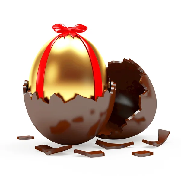 Golden Easter egg in a chocolate egg shell — Stock Photo, Image