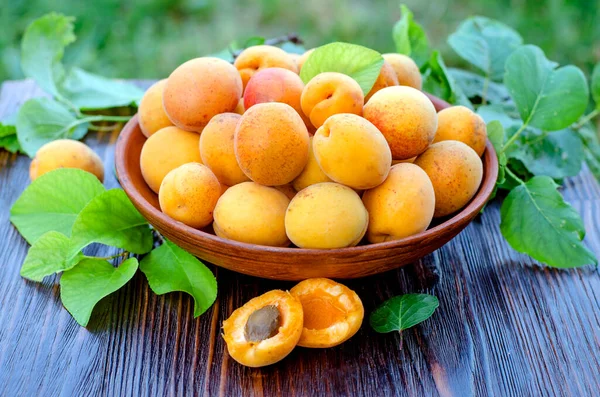 Fresh Ripe Organic Apricots Bowl Leaves Wooden Table Royalty Free Stock Photos