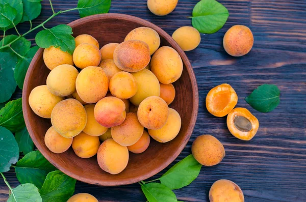 Fresh Ripe Organic Apricots Bowl Leaves Wooden Table Royalty Free Stock Images