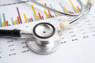 Çizelge üzerinde steteskop veya grafik kağıdı, Finansal, hesap, istatistik ve iş verileri tıbbi sağlığı.