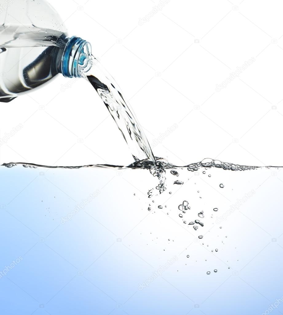 Water pour from water bottle, with clipping path