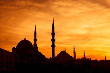 Istanbul minarets at beautiful sunset clipart