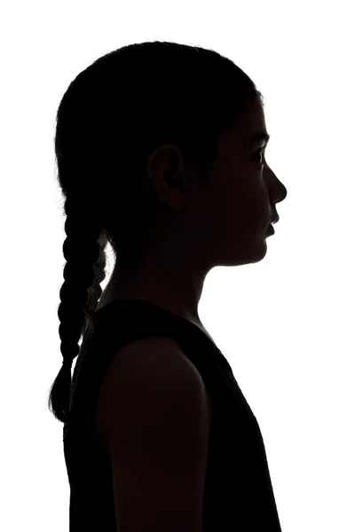 Silhueta escura de uma menina — Fotografia de Stock