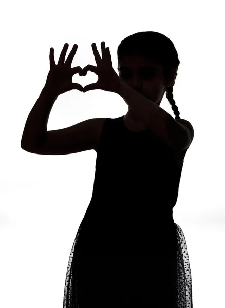 Girl making heart gesture — Stock Photo, Image