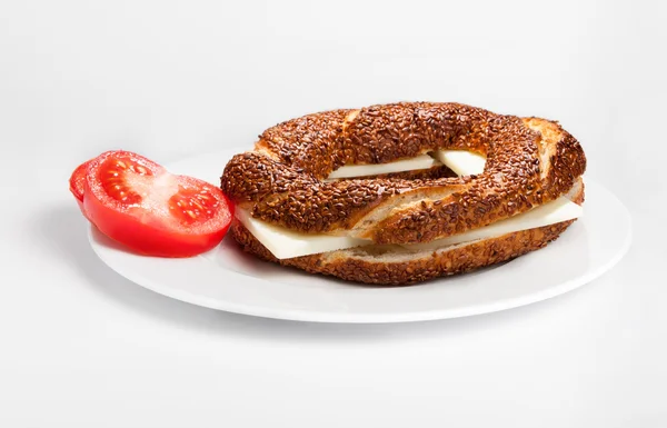 Sliced Turkish bagel with cheese — Stock Photo, Image