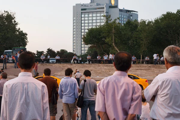 People protesting by standing in Taksim Square — Stok fotoğraf