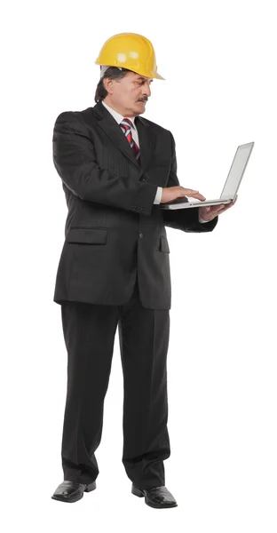 Modent forretningsmann med bærbar datamaskin – stockfoto