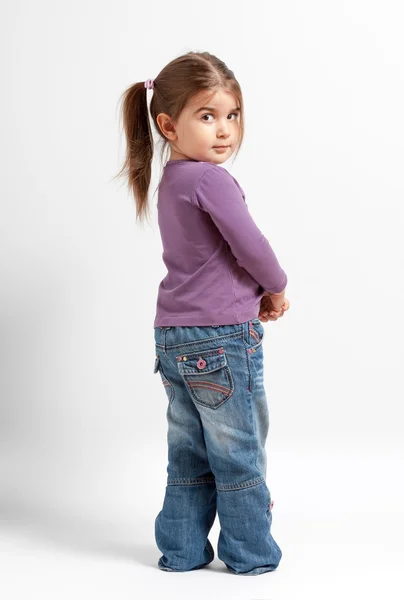 Cute little girl in purple — Stock Photo, Image