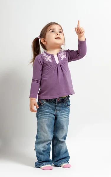 Cute little girl in purple — Stock Photo, Image