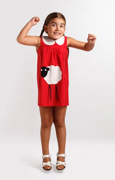 Linda niña en vestido rojo — Foto de Stock