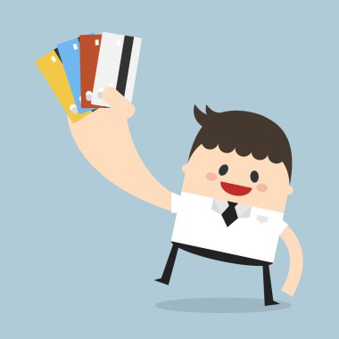 Kendine güvenen işadamı kredi kartı sağ eli ile tutarak