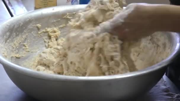 Baker prepares the dough by hands — Stock Video