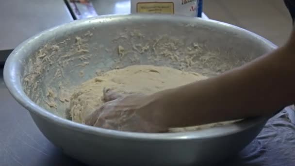 Baker kneads the dough by hands — Stock Video