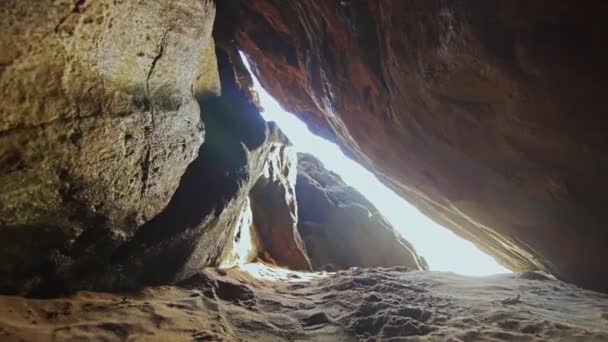 Out of the narrow cave into the light — Stock Video