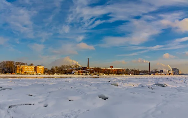 Panorama of the winter, frozen Neva River in St. Petersburg.