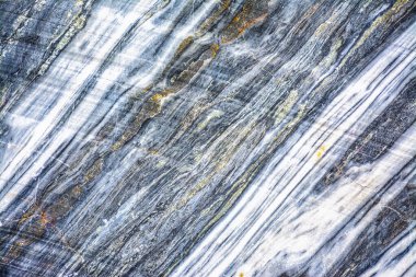 Karelia Cumhuriyeti 'ndeki Ruskeala' da terk edilmiş bir taş ocağında çeşitli türde mermer.. 