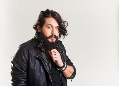 young guy in a black leather jacket