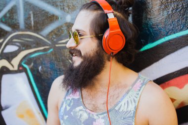 guy with  listening  music with headphones