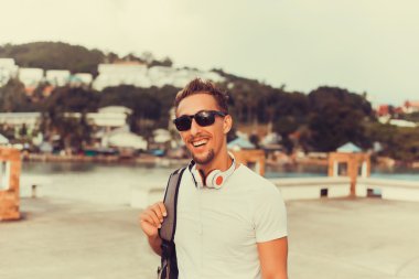 Bearded young man with earphones