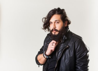 young guy in a black leather jacket