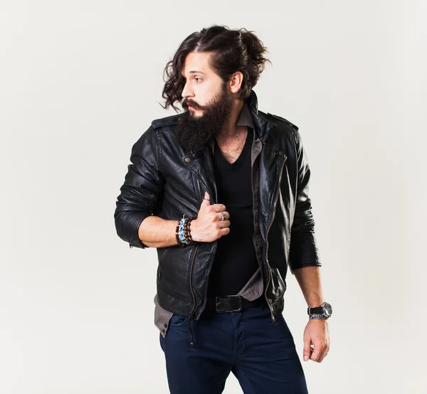 Young guy in a black leather jacket — Stock Photo, Image