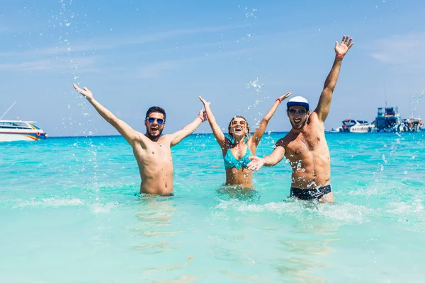 Friends standing in bikinis — Stock Photo, Image