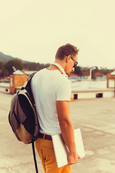 Bearded young man with earphones — Stock Fotó