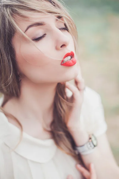 Beautiful girl in a bright dress — Stock Photo, Image