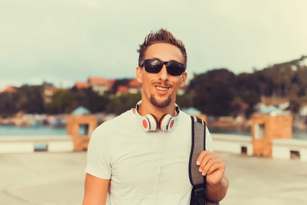 Bearded young man with earphones — Stok fotoğraf
