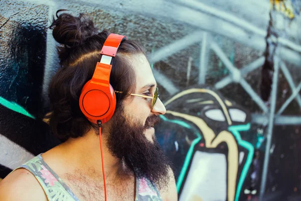 guy with  listening  music with headphones