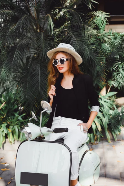 Young girl on  vintage scooter — Stock Photo, Image