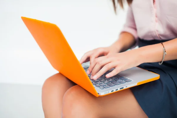 Beautiful girl working on laptop — Stock Photo, Image