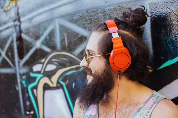 guy with  listening  music with headphones