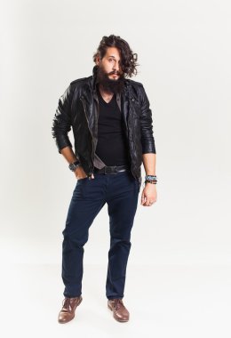 young guy in a black leather jacket