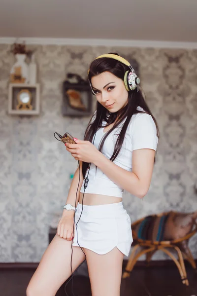 Sexy hipster girl and music — Stock Photo, Image