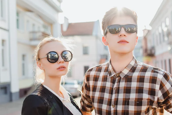 fashionable couple in sunglasses