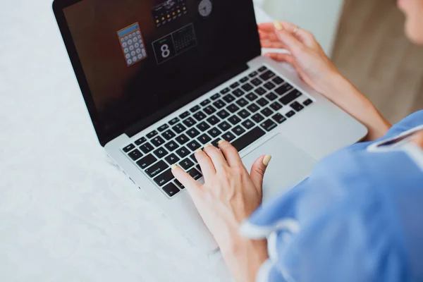 Young lady working at home — Stock Photo, Image