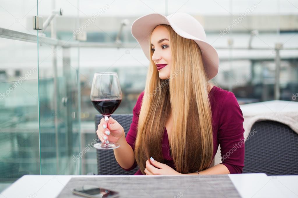 Young woman drinking red wine — Stock Photo © sergey_causelove